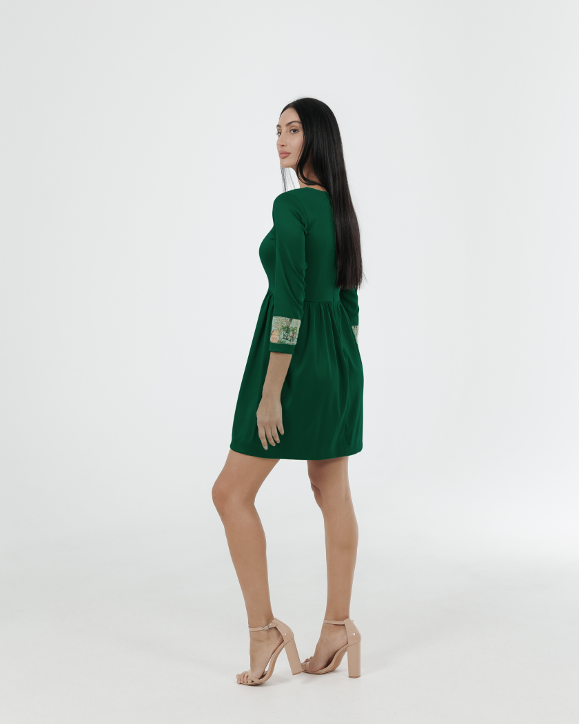 Nature Unwrapped Pleated Mini Dress With Peacock Print Detail